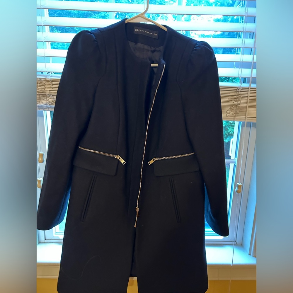Beautiful women’s fitted black jacket.
